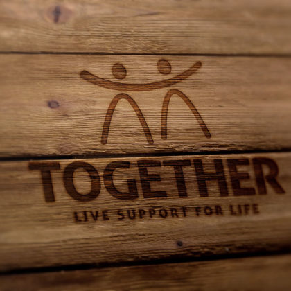 Logo Menschen Gemeinsam