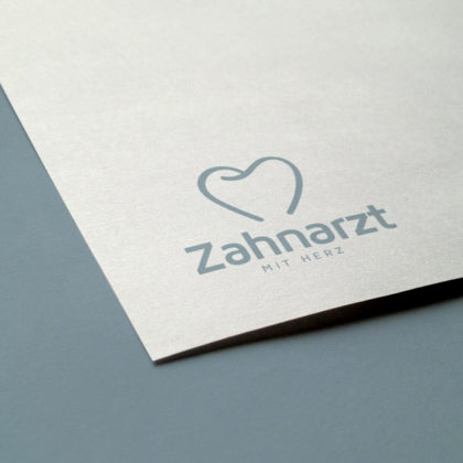 LogoAtelier Zahnarzt mit Herz