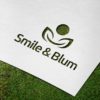 Logo Smile Blume Pflanzen Logo kaufen | Logoshop | LogoAtelier.eu