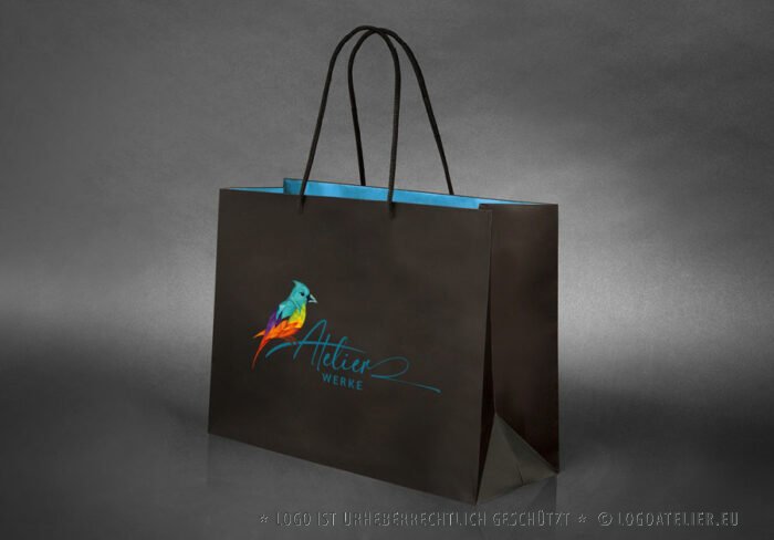 Kreatives Logo Bunter Vogel Tiere AllesInEinem Design Buchstabe Druckerei Initiale Modern Origami Fantasie Farbenfroh Federn Fliegen Flügel Frei Freiheit Weiblich Wissen LogoShop LogoAtelier.eu